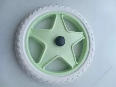 Kolečko ke kočárku pro panenky K - 11.