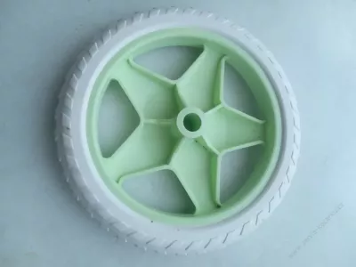 Kolečko ke kočárku pro panenky K - 11.