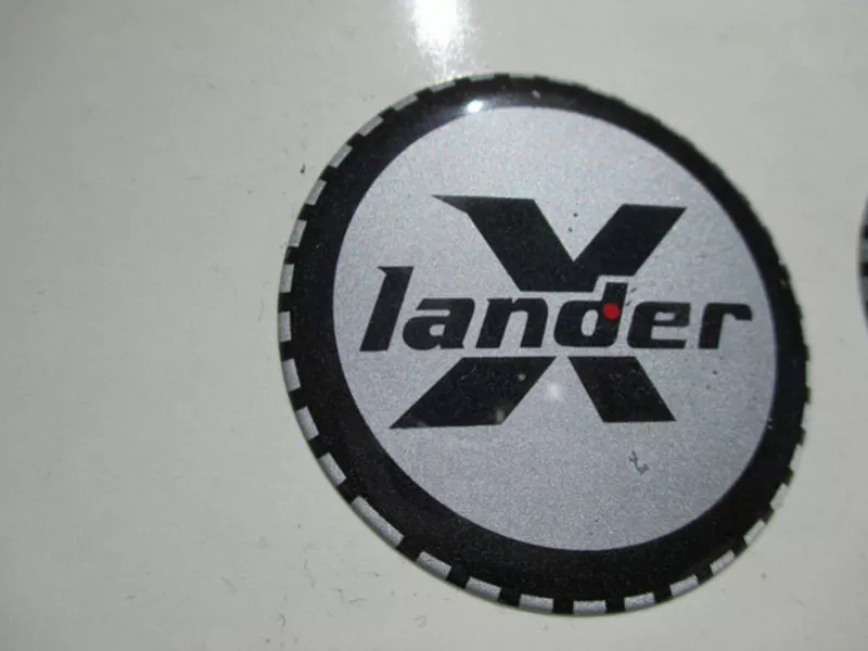 Nálepka kulatá X - lander.